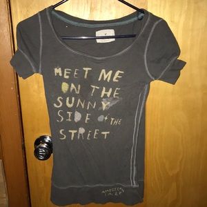 A grey tee with a quote